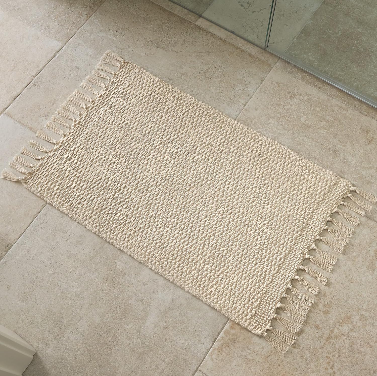 KIBAGA Boho Bathroom Rug - Soft 20x30 Inch Beige Cotton Mat with Tassels